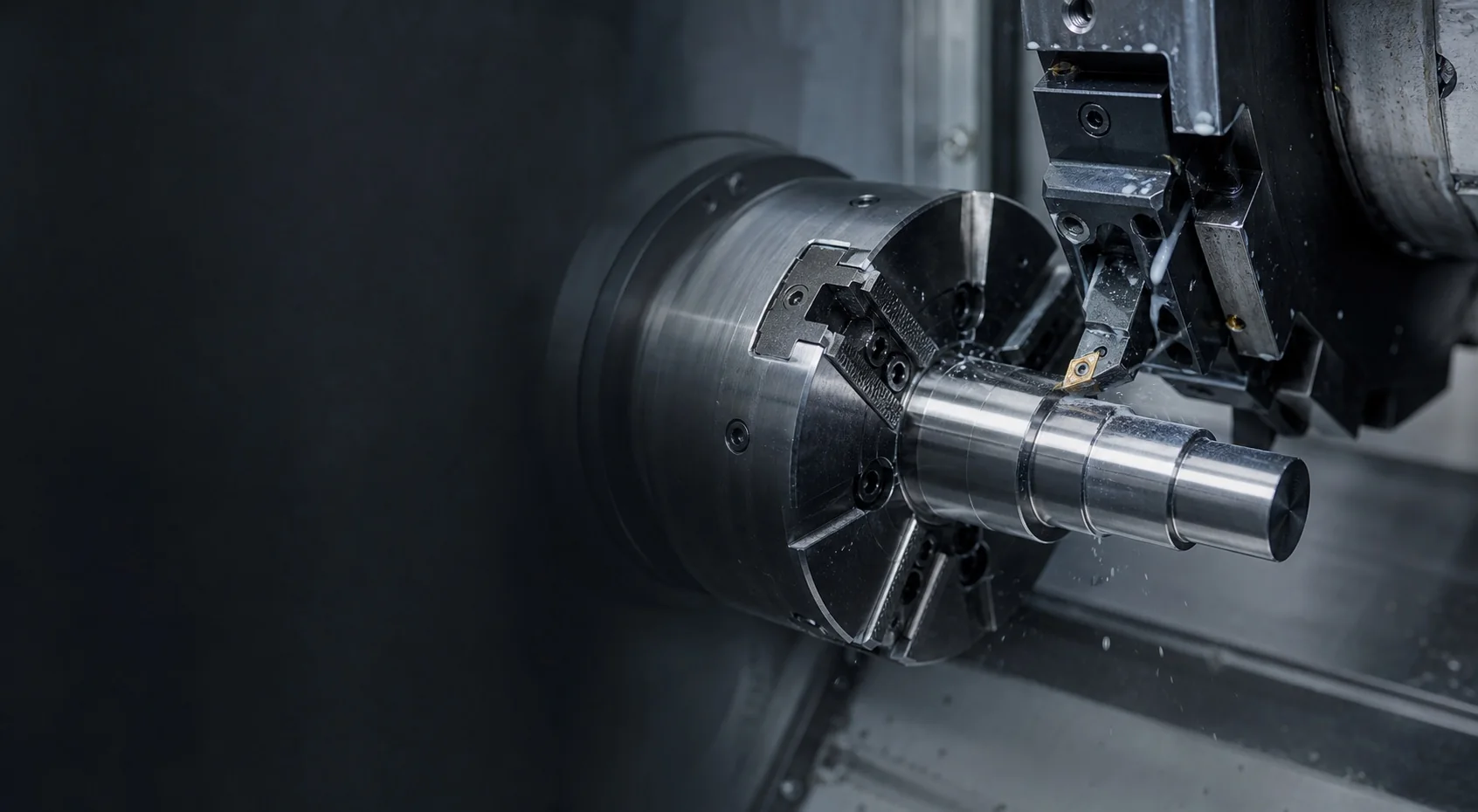 CNC turning center machining a stainless-steel cylindrical component