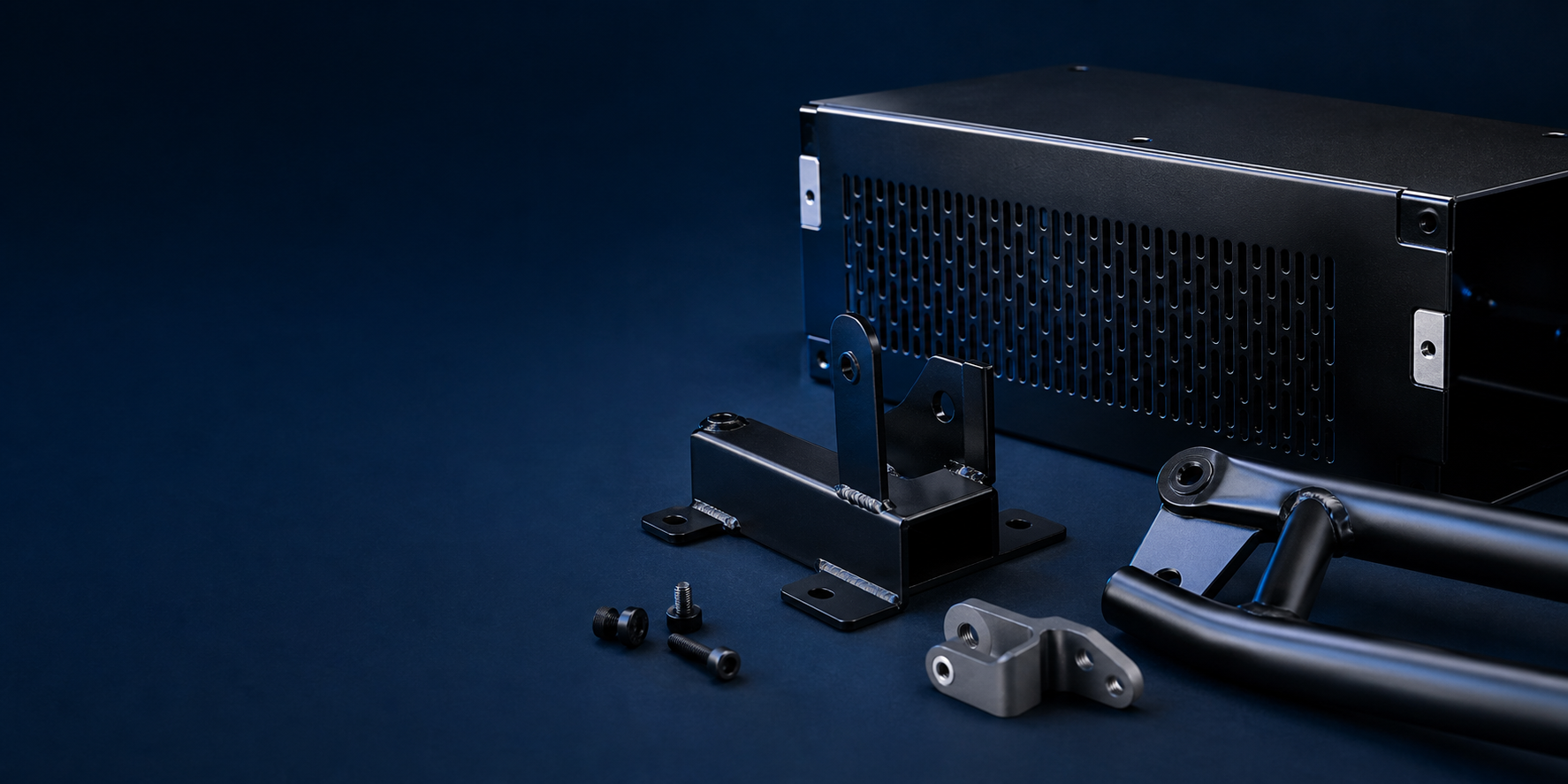 Precision housings, welded brackets, frame sections, and fasteners with black electrophoretic coating