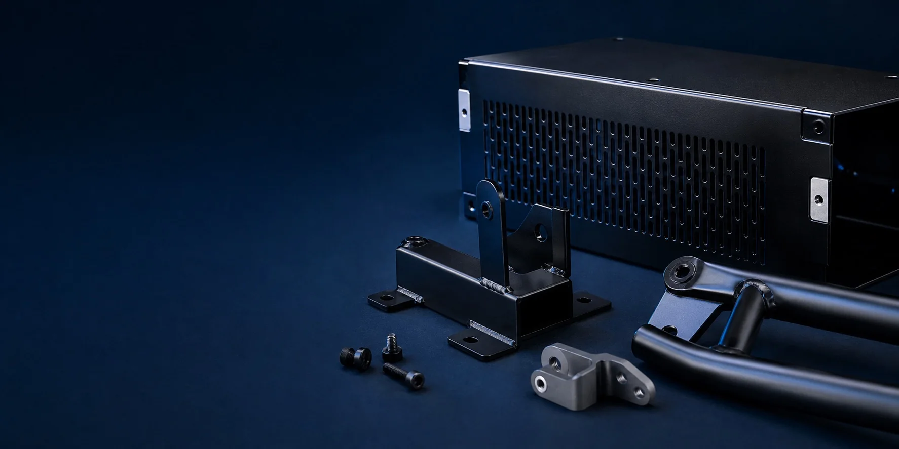 Precision housings, welded brackets, frame sections, and fasteners with black electrophoretic coating